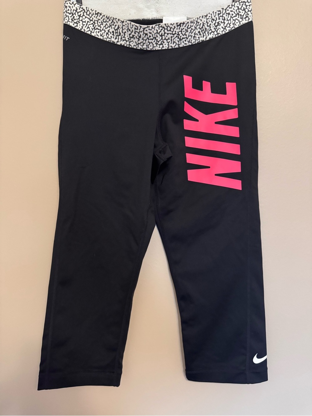 Nike Women's Black Capri Athletic Leggings with Pink Logo